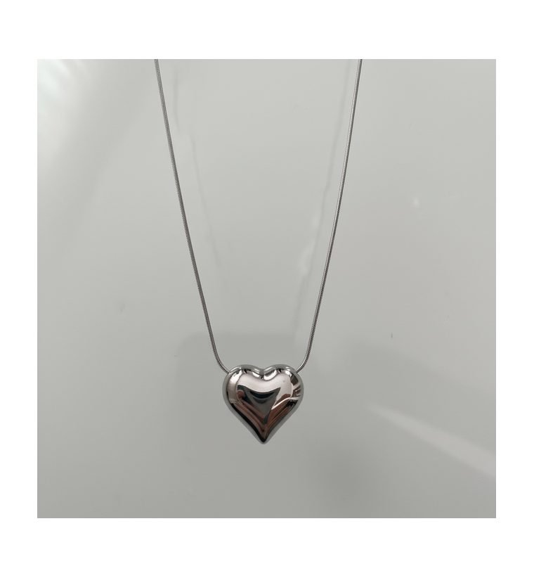 Cœur Signature Pendant — silver-tone sculpted heart necklace